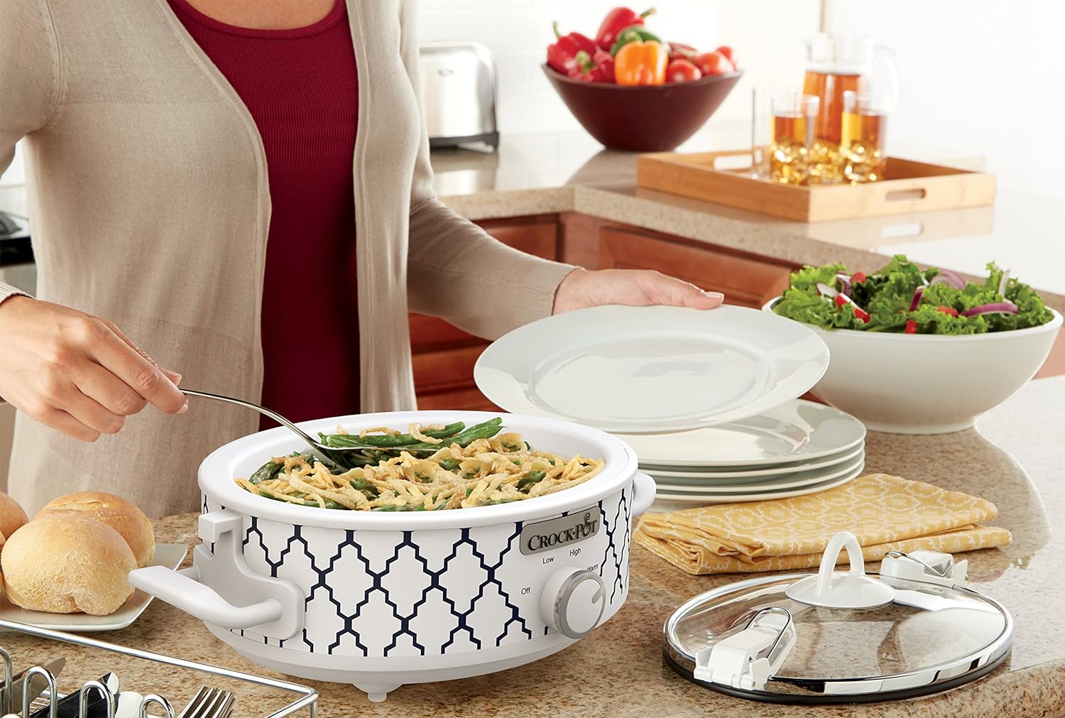 About this item Compact 2.5 Quart Capacity: Perfect for dinners, potlucks and parties Oven-Safe Stoneware: Removable and casserole-shaped for easy serving High, Low and Warm Settings: Precision cooking and keeping food warm Cook & Carry locking lid system: For hassle-free and neat transportation Dishwasher Safe: Stoneware and lid for easy clean-up Robust Material: Contains Aluminum, Stainless Steel for durability Versatility: Great for make-ahead meals, entertaining, and when conventional oven space is limited.